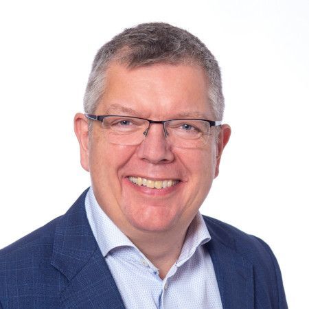 Professional headshot of Jesper