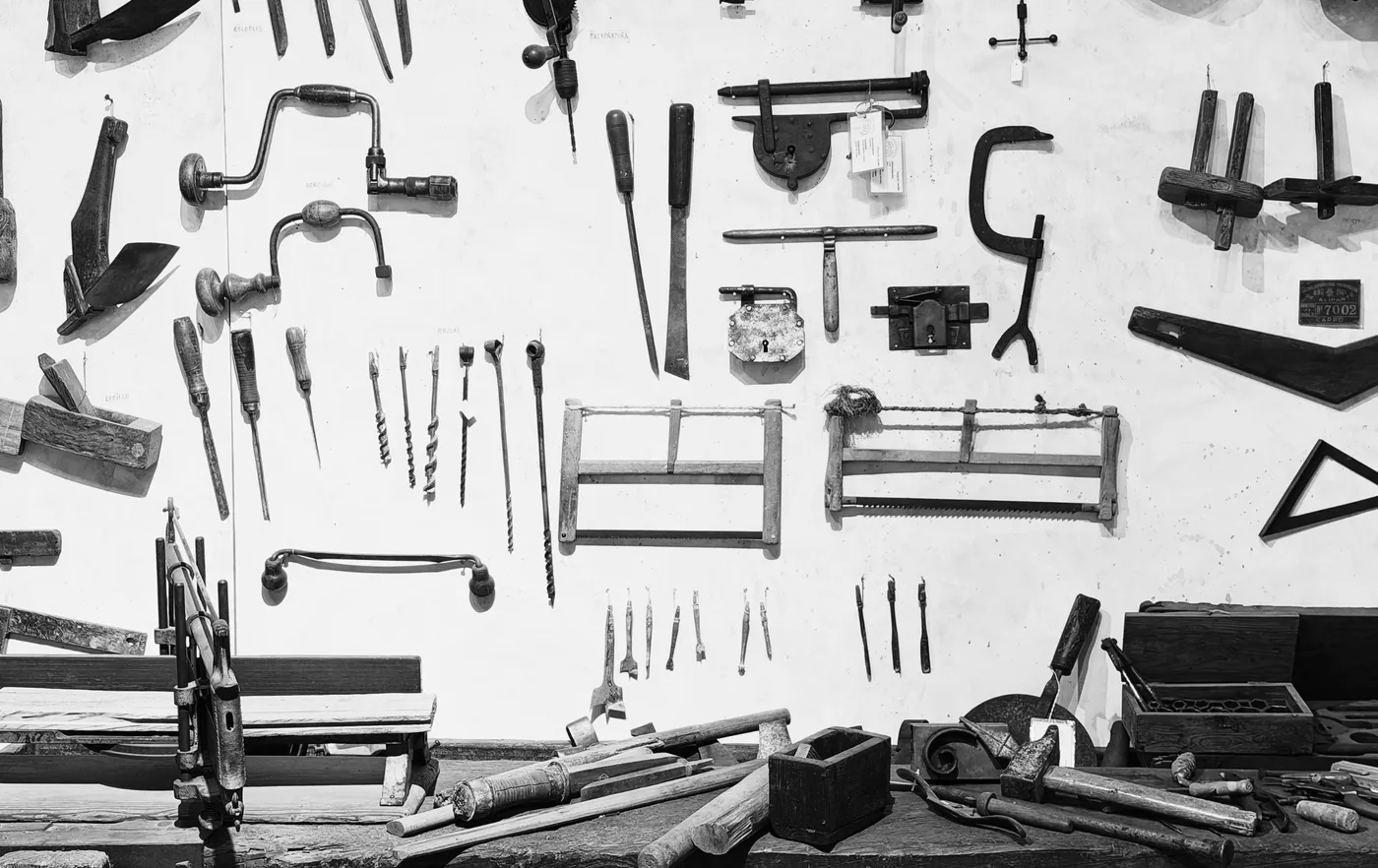 A group of tools on the wall that could be used alone or in tandem with others